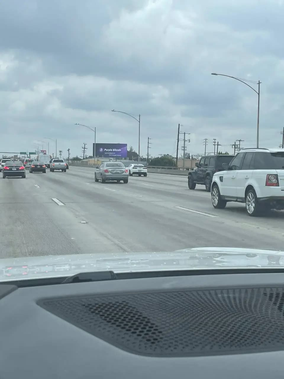 Community holder view of Purple Bitcoin billboard placement