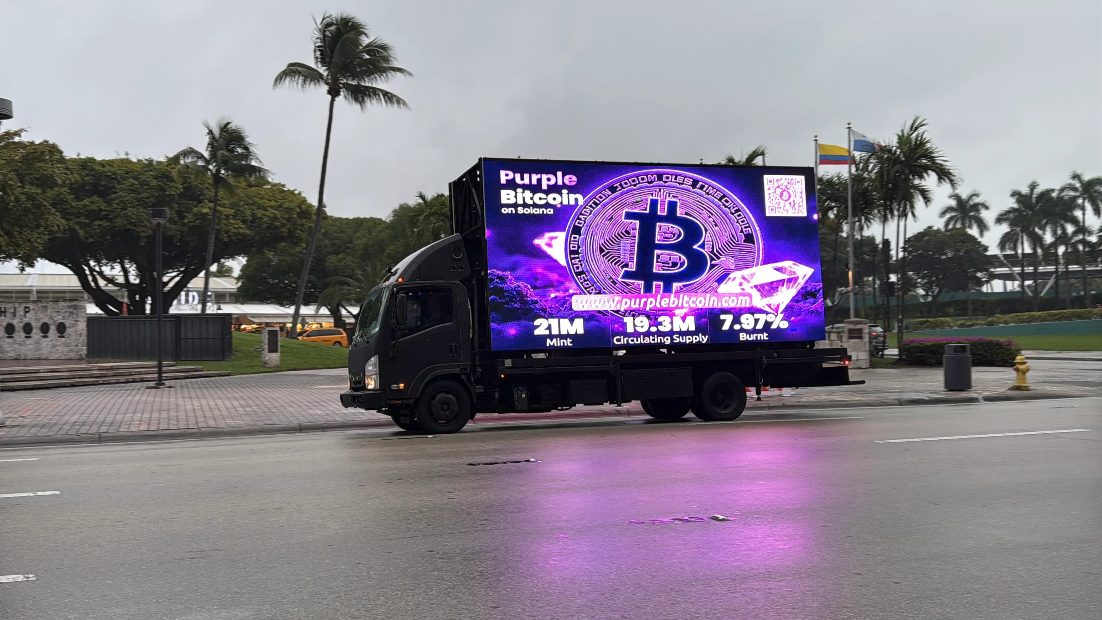 Purple Bitcoin promotional truck branding at WAGMI